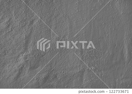 Textured gray plaster wall surface with brushstroke, painted, aged concrete background 122733671