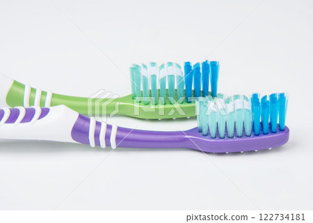 Multicolor toothbrush for teeth on the white background Multicolor toothbrush for teeth on the white background 122734181
