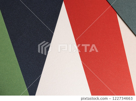 Textured paper pattern with layered colours in red, green, and white. Elegant and artistic surface Textured paper pattern with layered colours in red, green, and white. Elegant and artistic surface 122734663