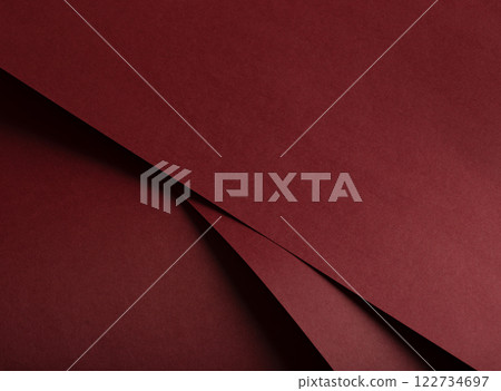 Burgundy paper texture with a rich matte finish. Elegant and stylish background with a deep, 122734697