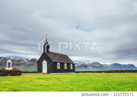 Mountain View Iceland. Beautiful black wooden church in Budir 122735571