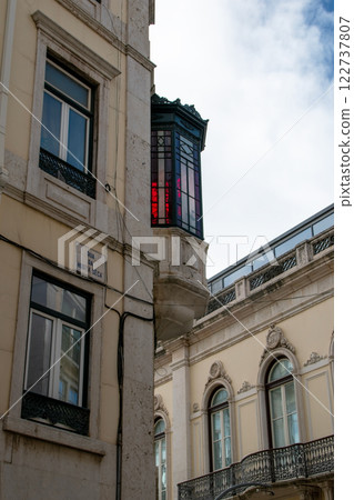 Facade of an old house with a bay window, European historical buildings, Lisbon, Portugal 122737807