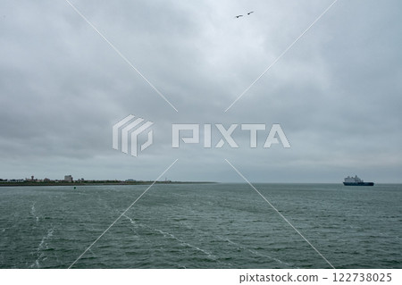 Den Helder, The Netherlands, Oktober 28th, 2024, A Serene and Beautiful Seascape Under a Cloudy Sky 122738025