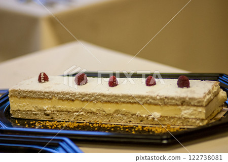 This is a Delicious and Beautiful Layered Cake with Raspberries and Cream Filling This is a Delicious and Beautiful Layered Cake with Raspberries and Cream Filling 122738081
