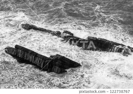 Empty wild sandy beach, Atlantic Ocean seascape, sea waves, beautiful cloudscape, dramatic landscape, travel content, Lisbon, Portugal 122738767
