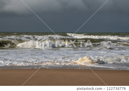 Empty wild sandy beach, Atlantic Ocean seascape, sea waves, beautiful cloudscape, dramatic landscape, travel content, Lisbon, Portugal Empty wild sandy beach, Atlantic Ocean seascape, sea waves, beautiful cloudscape, dramatic landscape, travel content, Lisbon, Portugal 122738776