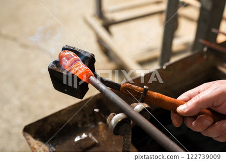 Handmade figures of melted glass - selective focus Handmade figures of melted glass - selective focus 122739009