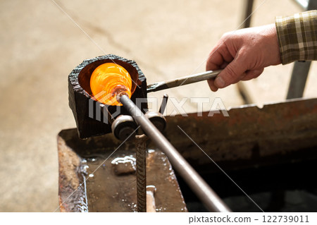 Handmade figures of melted glass - selective focus 122739011