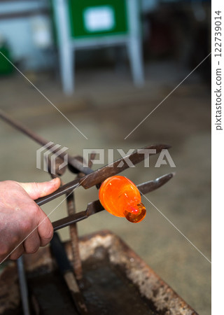 Handmade figures of melted glass - selective focus 122739014