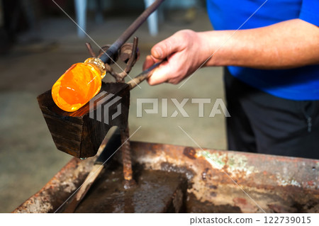 Handmade figures of melted glass - selective focus Handmade figures of melted glass - selective focus 122739015