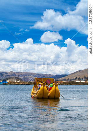 Totora boat on the Titicaca lake near Puno, Peru 122739604