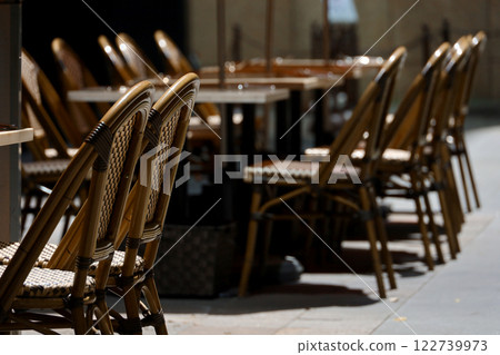 An open cafe before opening time with no one there 122739973