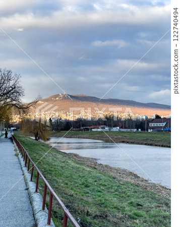 View of Mount Zobr from the embankment of the Nitra River in the city of Nitra, Slovakia 122740494