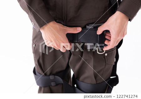 Image of wearing a construction harness (stock photo) Image of wearing a construction harness (stock photo) 122741274