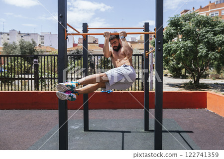 Young man practicing sports outside 122741359