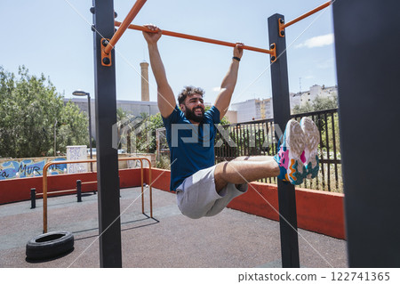 Young man practicing sports outside Young man practicing sports outside 122741365