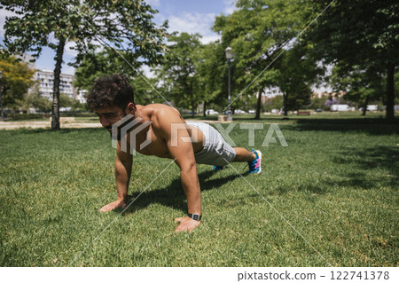 Young man practicing sports outside 122741378
