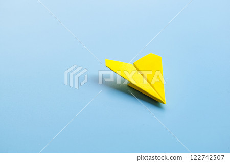 Origami of a single yellow airplane with customizable space for text 122742507