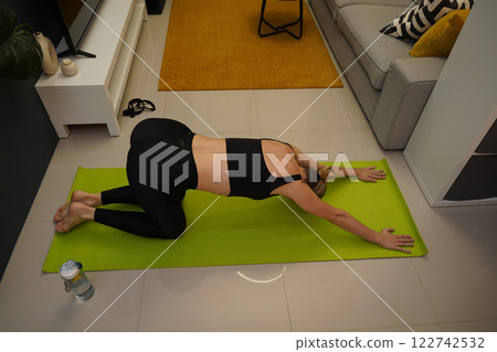 A young woman have a joyfully yoga practice  122742532