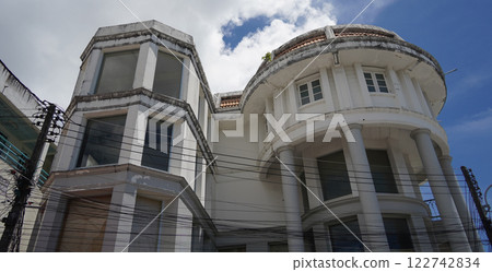 Detailed view of windows, doors and balconies of city buildings  122742834