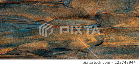 Vibrant Abstract Texture with Blue, Golden and Brown Streaks Blending in Shimmering Pattern 122742944