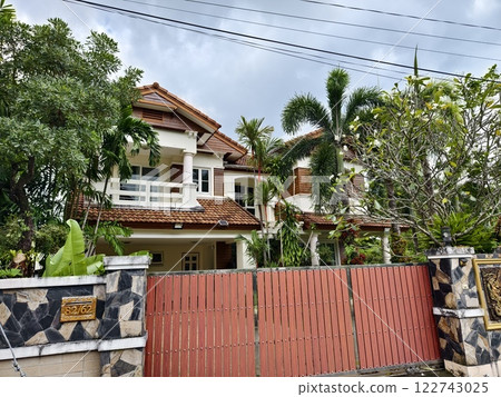 Detailed view of windows, doors and balconies of city buildings  122743025