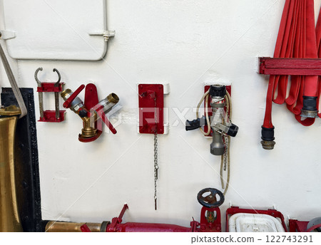 A fire hydrant with two separate valves on an vessel 122743291