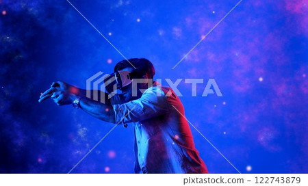Gamer access metaverse by using VR glasses and playing shooting game. Apparatus. Gamer access metaverse by using VR glasses and playing shooting game. Apparatus. 122743879