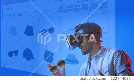 Customer sitting on the sofa while looking at online market hologram. Apparatus. Customer sitting on the sofa while looking at online market hologram. Apparatus. 122744025