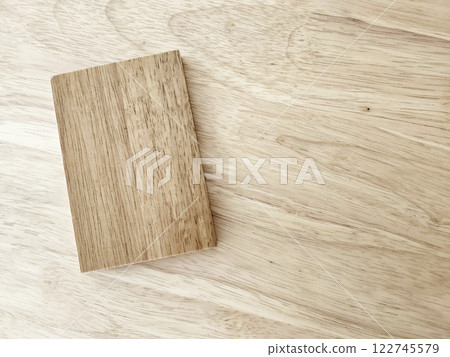 Piece of Oak Wood on the Table. 122745579