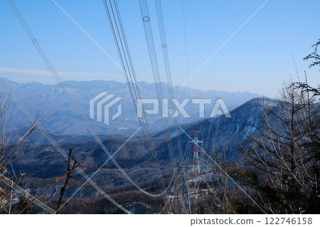 Power lines connecting mountain areas 122746158
