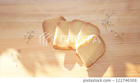 Homemade shortbread cookies on wood board. 122746308