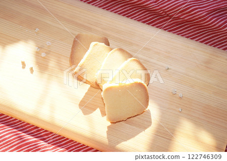 Homemade shortbread cookies on wood board. 122746309