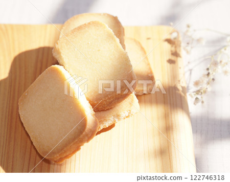 Homemade shortbread cookies on wood board. 122746318