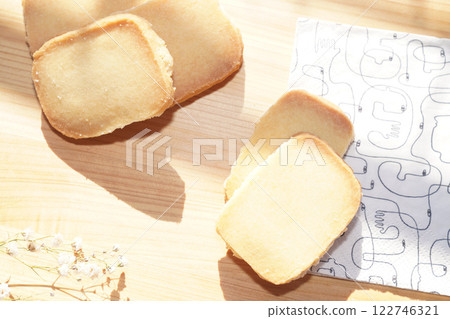 Homemade shortbread cookies on wood board. 122746321
