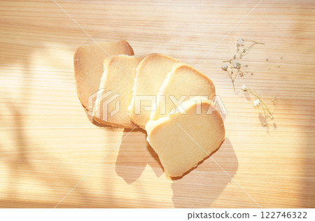 Homemade shortbread cookies on wood board. 122746322