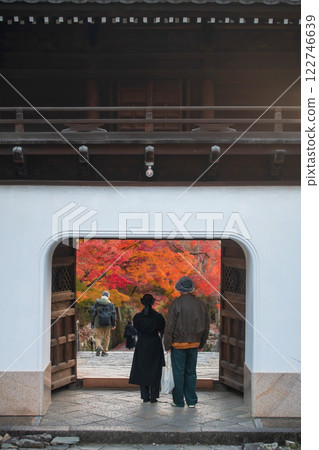 couple at Koshoji Temple gate view colorful fall tree tunnel, Uji couple at Koshoji Temple gate view colorful fall tree tunnel, Uji 122746639