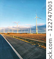 Wind power plant along the road 122747003