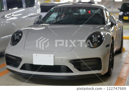 Image of a sports car in a parking lot Image of a sports car in a parking lot 122747989