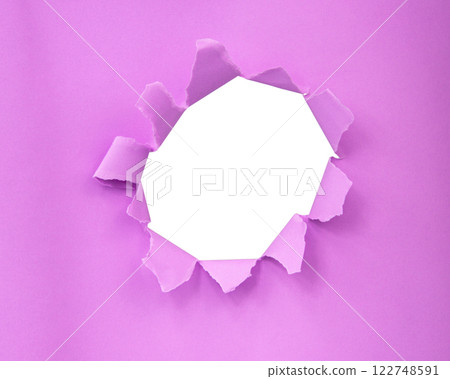 Pink color paper with circle hole in damaged background 122748591