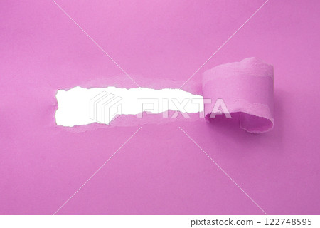 Hole in paper pink color background damaged ripped Hole in paper pink color background damaged ripped 122748595