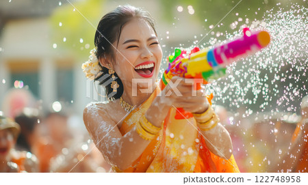 A group of people joyfully splash water on each other during Songkran Day. The concept of festivity, cultural tradition, and the spirit of renewal. Generative AI. 122748958