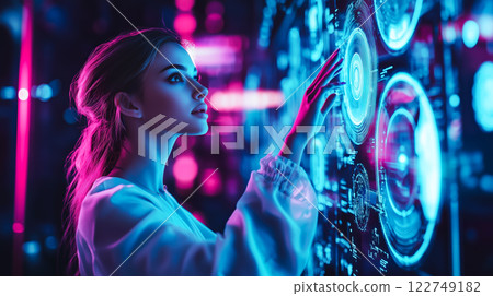 A modern lady interacts with futuristic technology, engaging with holographic displays. The concept of innovation, artificial intelligence, and the evolution of human-technology interaction.  122749182