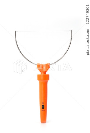 Electric styrofoam cutter with an orange handle and a thin heated wire, isolated on a white background. 122749301