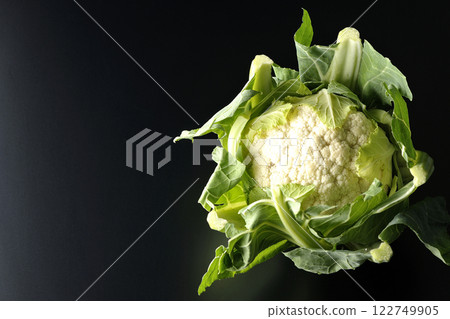 Cauliflower photographed against a black background 122749905