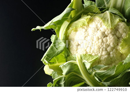 Cauliflower photographed against a black background 122749910