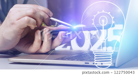 Futuristic Innovation Concept with Stylus Interaction on Smartphone, Lightbulb Icon Symbolizing Ideas, and a Modern 2025 Workspace Futuristic Innovation Concept with Stylus Interaction on Smartphone, Lightbulb Icon Symbolizing Ideas, and a Modern 2025 Workspace 122750043