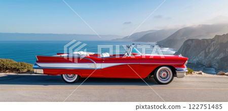 Classic Red Convertible on Scenic Coastal Road for Vintage Travel Photography 122751485