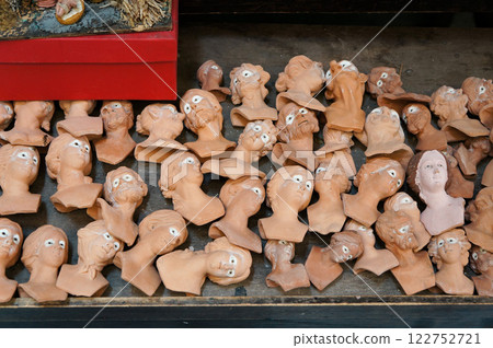 Miniature faces you'll find in souvenir shops overseas Miniature faces you'll find in souvenir shops overseas 122752721