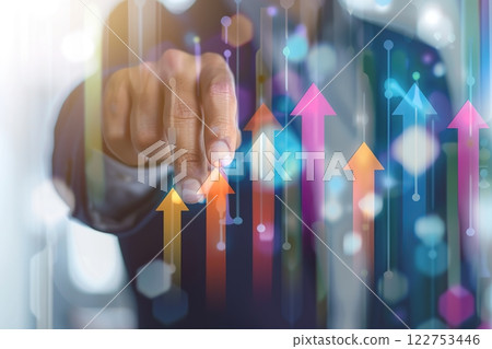 Increased profits. Benchmarking. Businessman analyzes profitability of working companies with digital augmented reality graphics, positive indicators, growing up graph and charts, colorful arrows. 122753446
